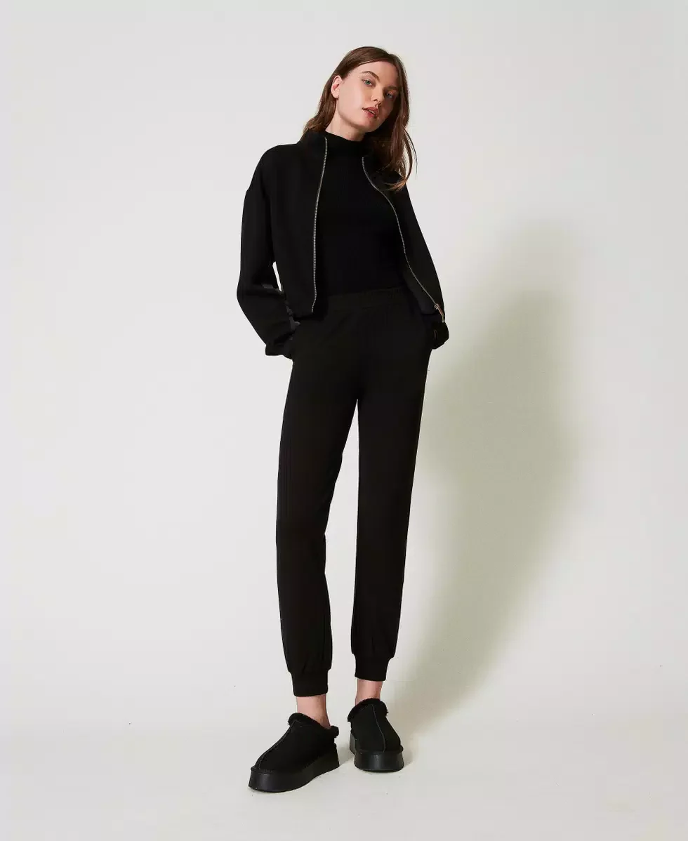 Pantaloni joggers con tasche Twinset