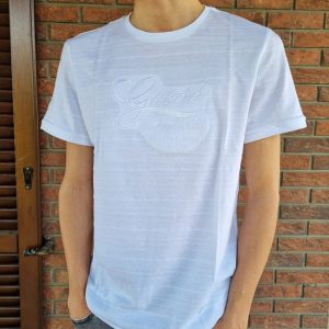 T-shirt GUESS per ragazzo color bianco tessuto fiammato e scritta GUESS ricamata bianca